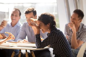 colleagues laughing with each other